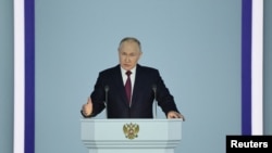 Russian President Putin delivers his annual address to the Federal Assembly in Moscow